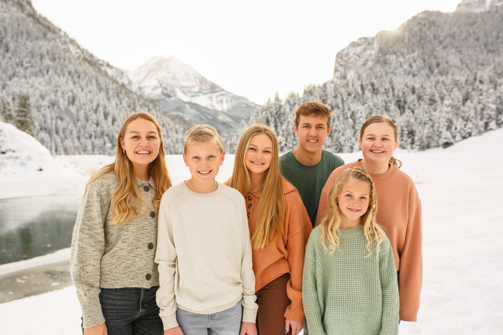 The Mainord family in the snowy Utah mountains